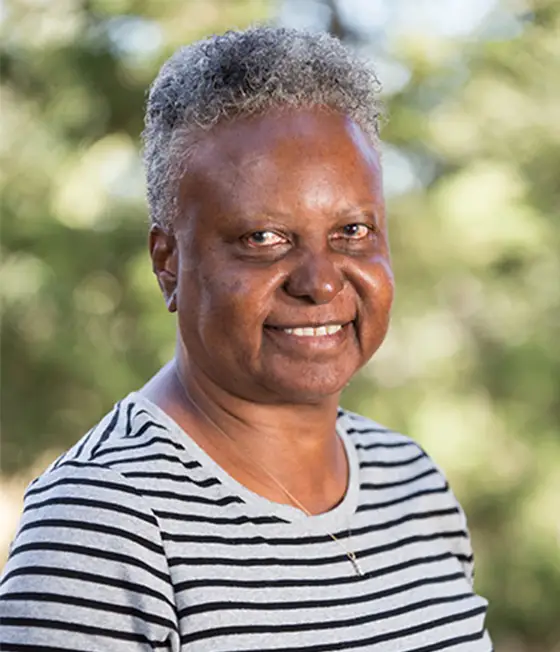 a woman smiling for a picture