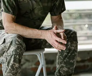 a person in a camouflage uniform