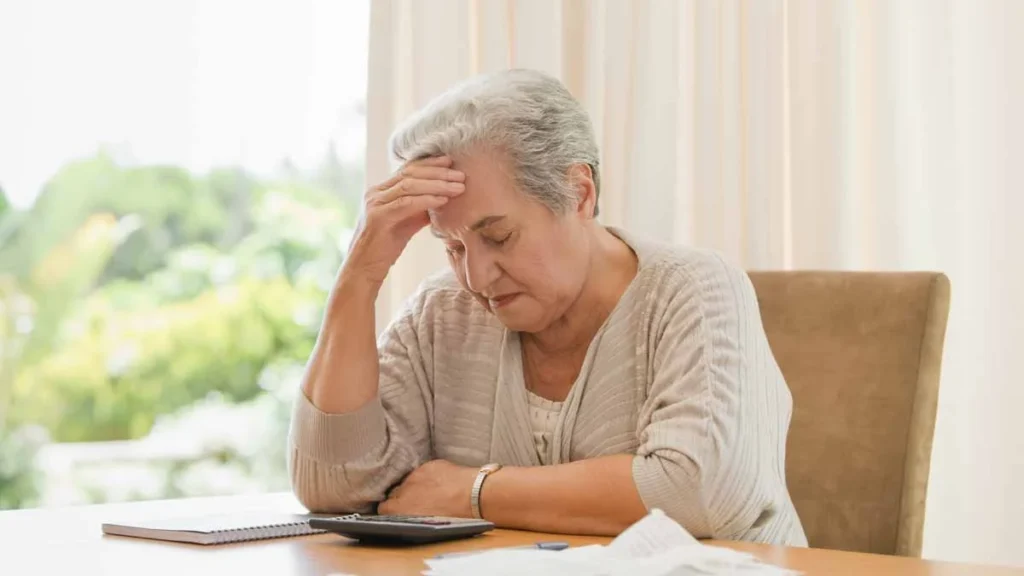 Senior woman worried about finances