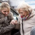 caregiver helping senior